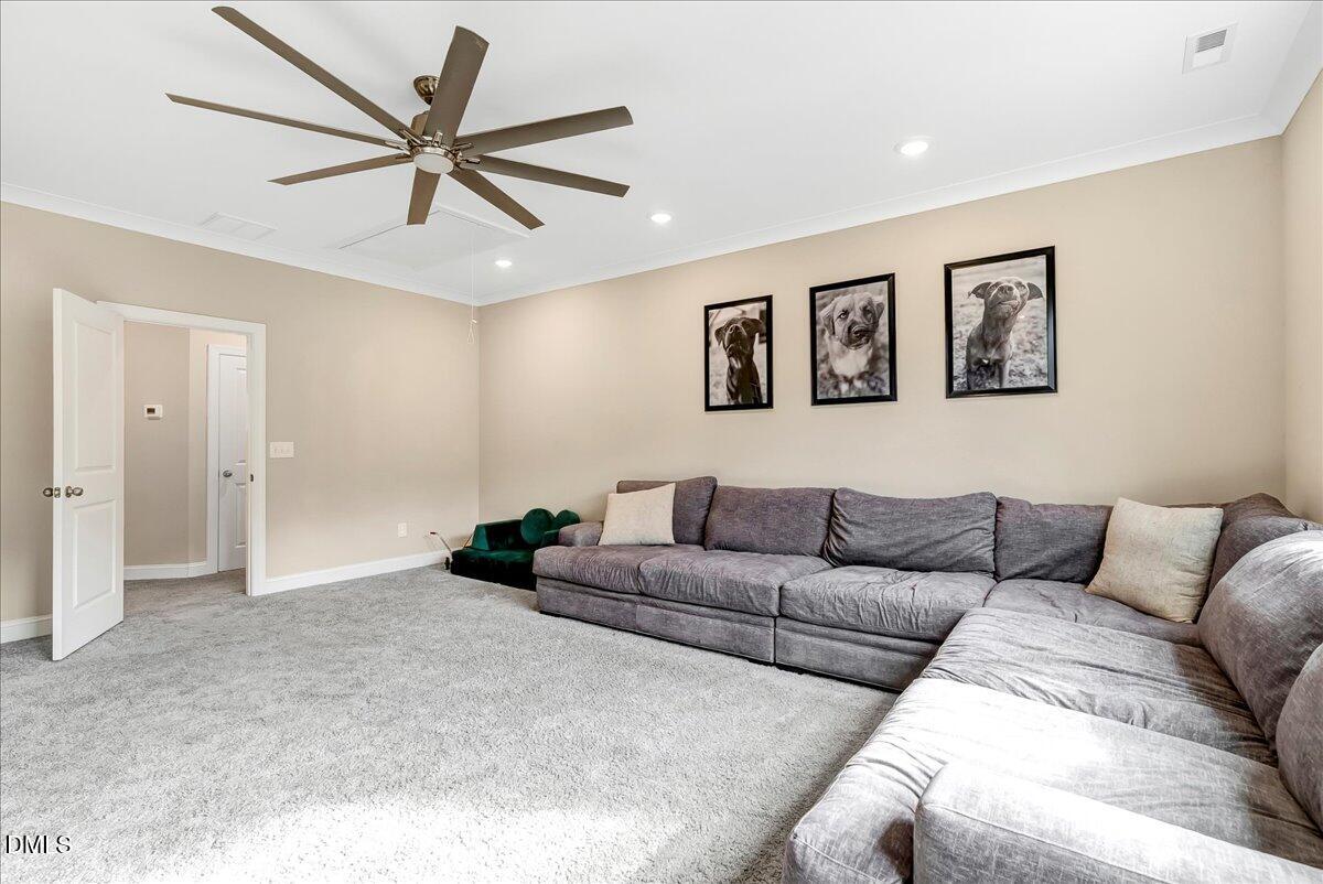 1208 Montgomery Road Franklinton, NC 27525 - Photo 33 of 62 a living room with furniture and window