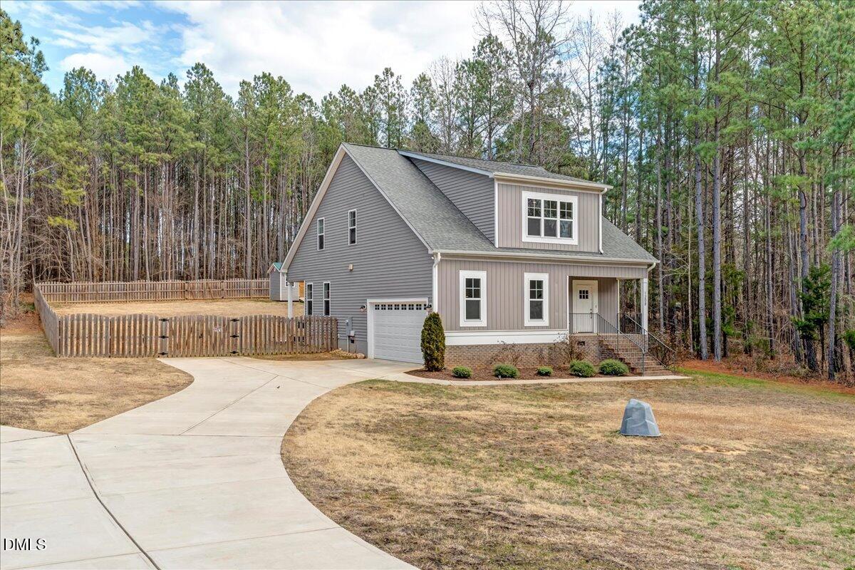 1208 Montgomery Road Franklinton, NC 27525 - Photo 39 of 62 a front view of a house with a yard