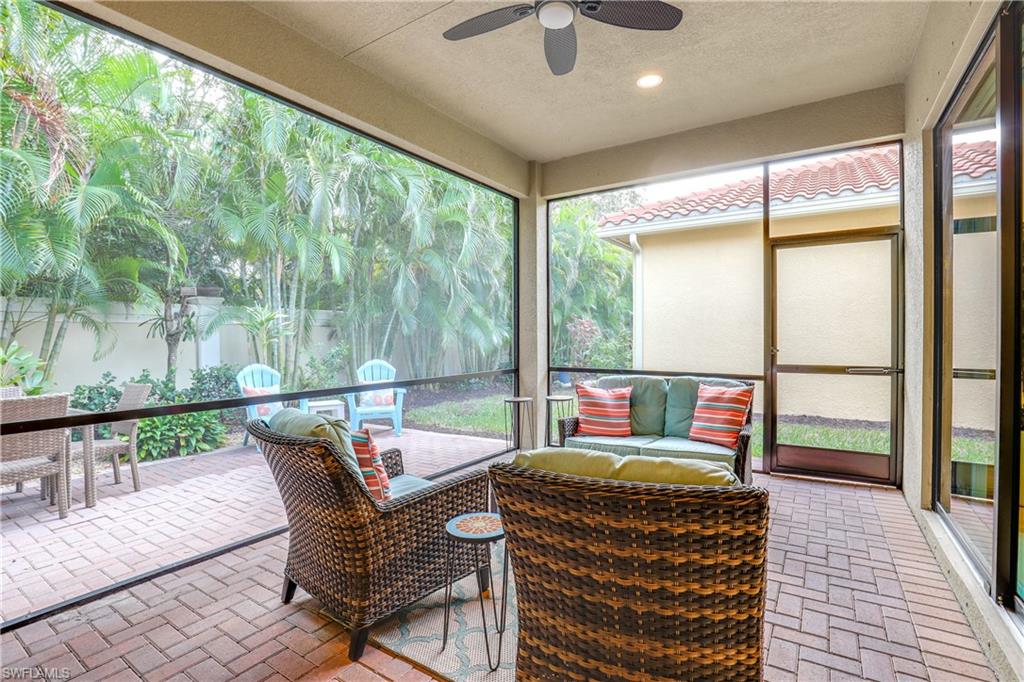 13435 Silktail Drive Naples, FL 34109 - Photo 18 of 27 a view of a dining room with furniture window and outside view
