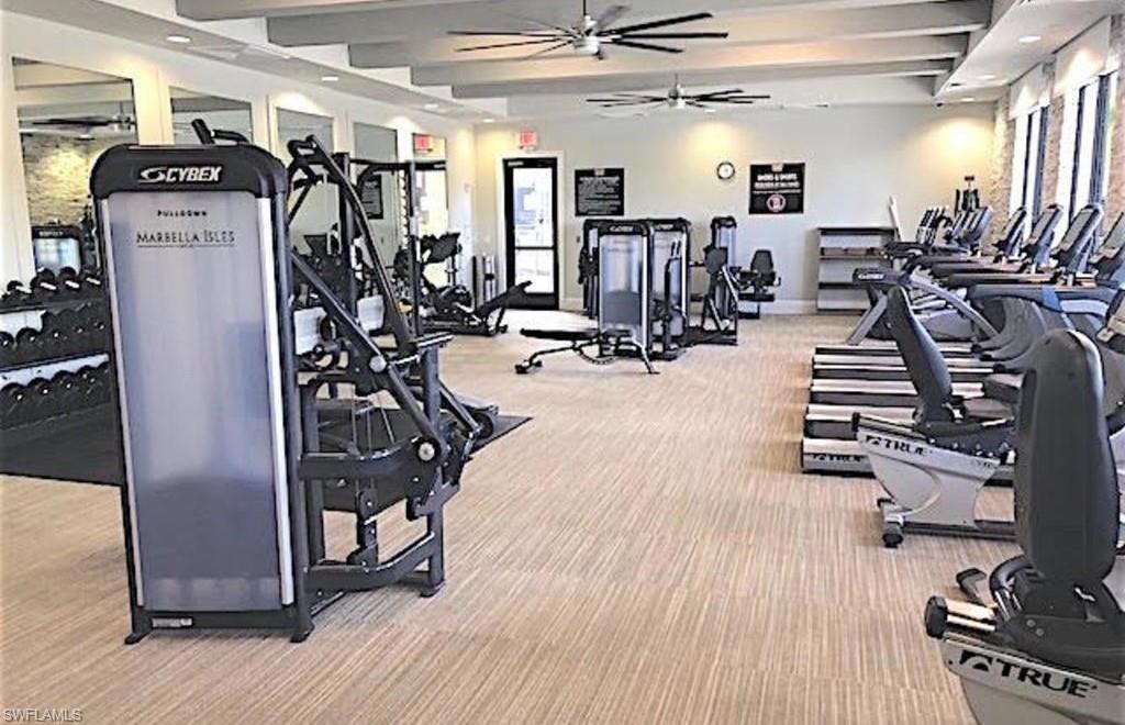 13435 Silktail Drive Naples, FL 34109 - Photo 20 of 27 a view of a room with gym equipment