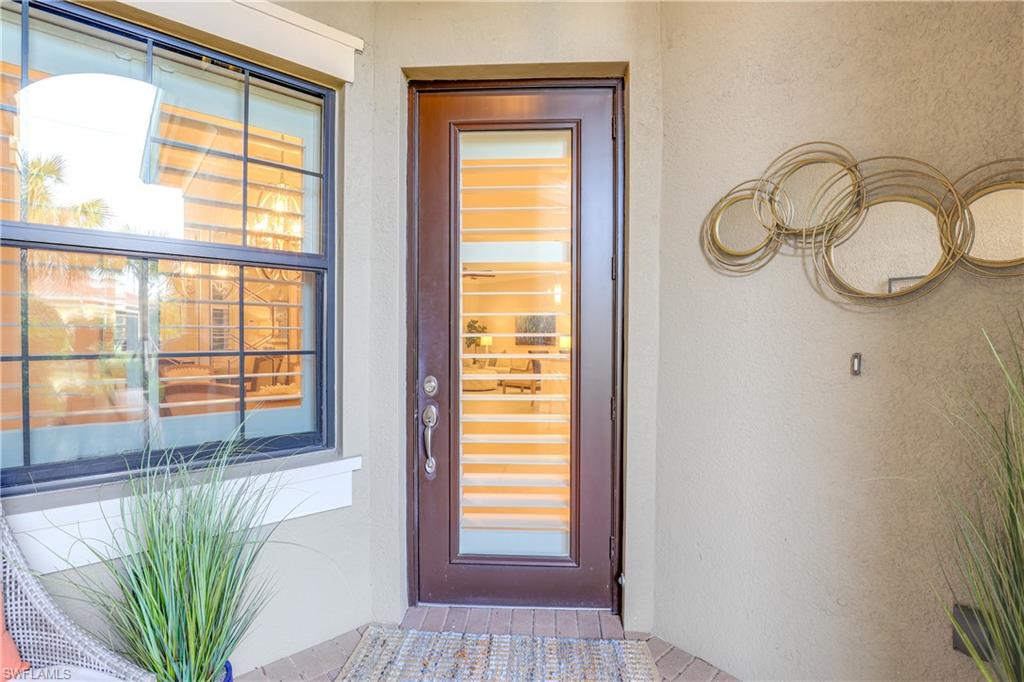 13435 Silktail Drive Naples, FL 34109 - Photo 2 of 27 a view of a potted plant in a room