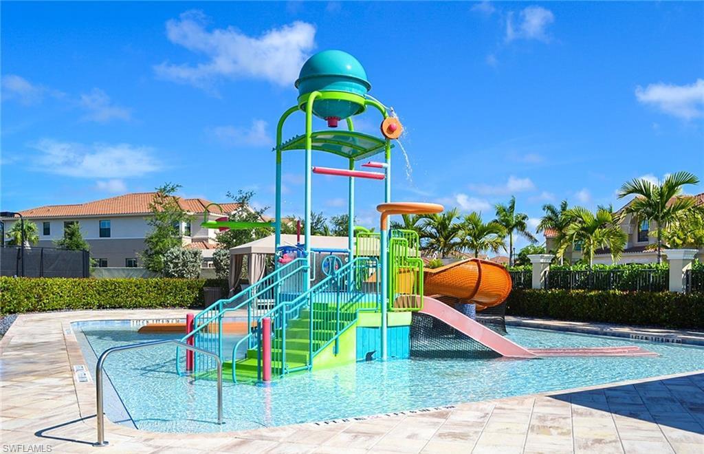 13435 Silktail Drive Naples, FL 34109 - Photo 23 of 27 a view of a park with plants and outdoor seating