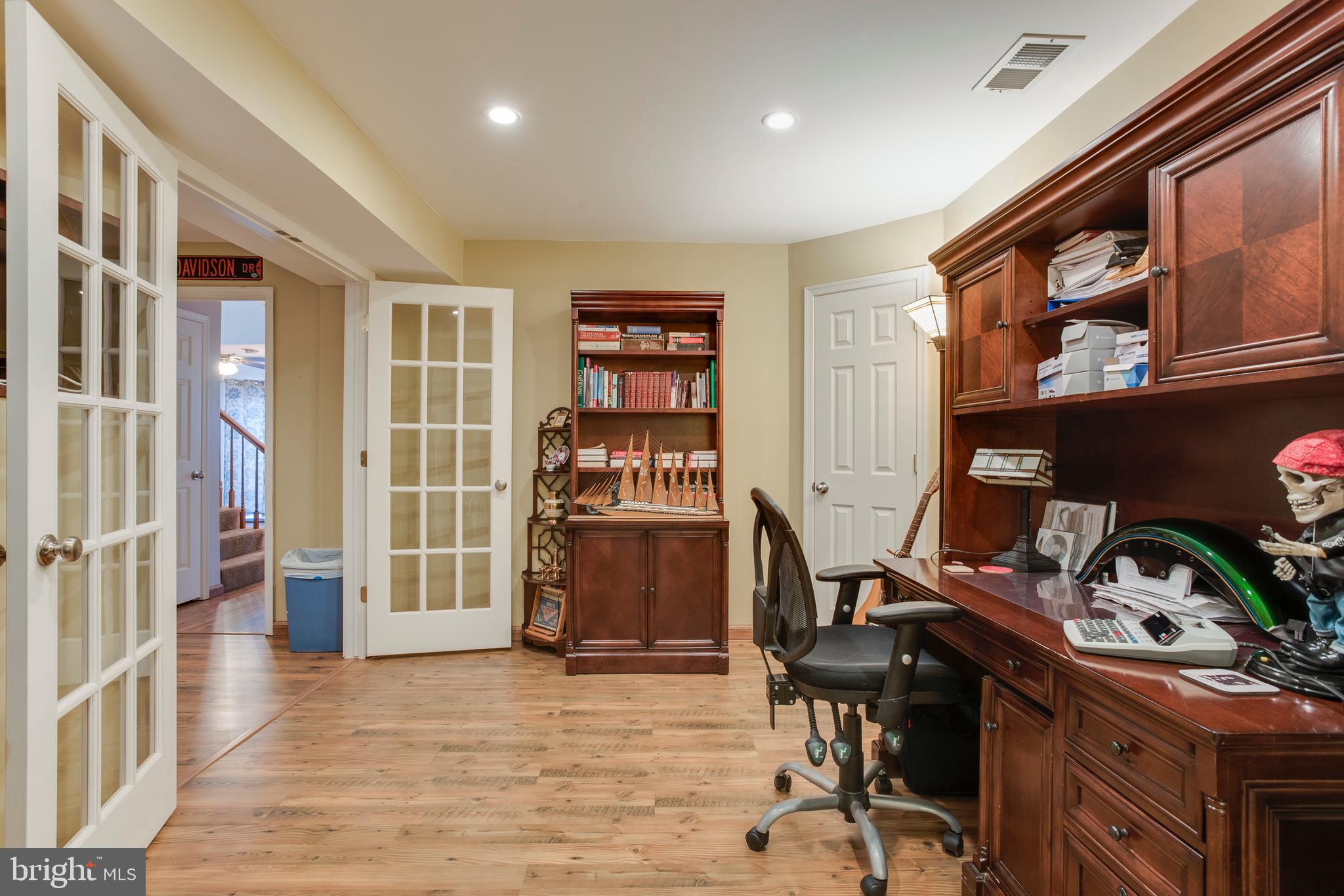 8564 Opal Road Warrenton, VA 20186 - Photo 29 of 42 Office with custom bookshelves
