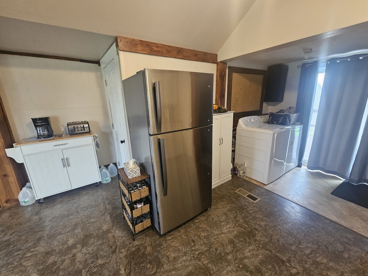 1770 Hoover Road Deer Grove, IL 61243 - Photo 3 of 19 a view of a kitchen with refrigerator and a sink