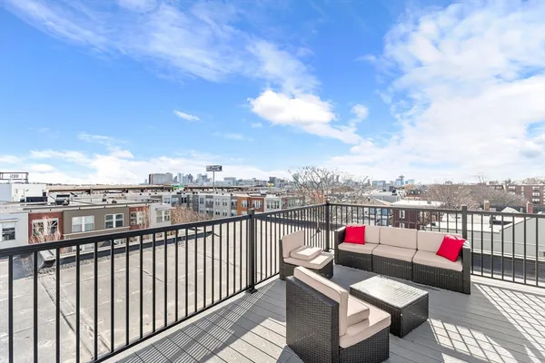 a view of city from terrace along with seating space