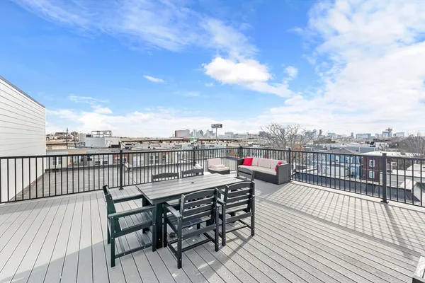 a view of roof deck with patio