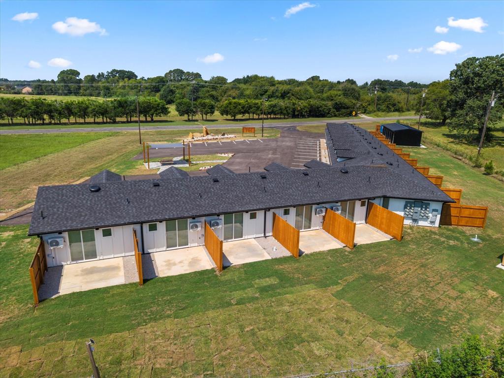 900 South Tool Drive, Unit 6 Tool, TX 75143 - Photo 4 of 7 a aerial view of house with yard and lake view