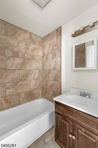 a bathroom with a sink and a bathtub