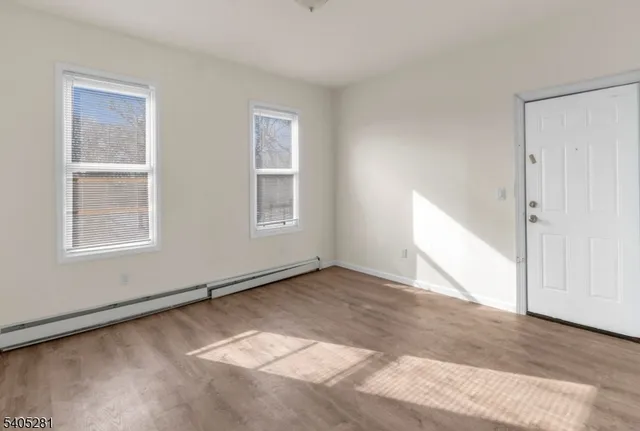 an empty room with windows