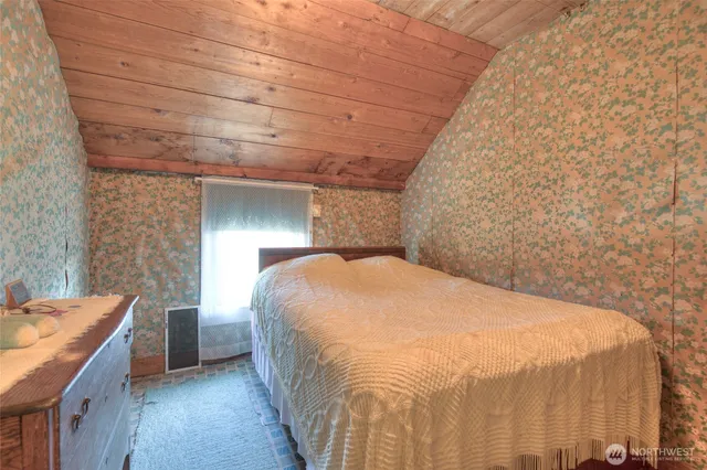 a room with furniture and a window