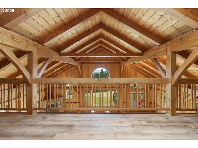 a bathroom with a granite countertop sink a toilet mirror and bathtub