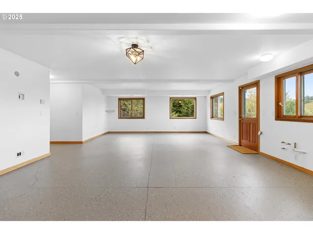 an empty room with windows