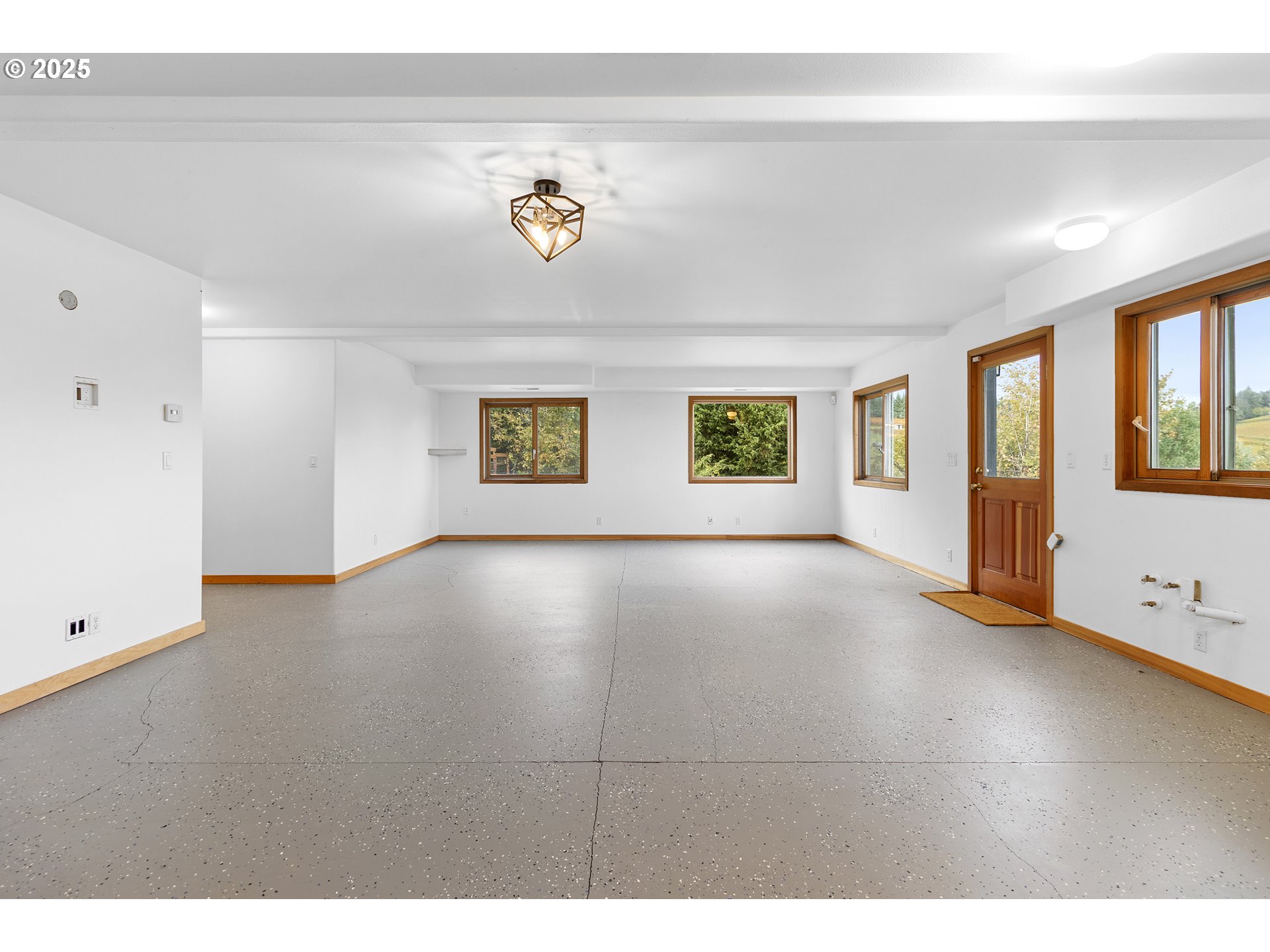 9325 Northeast Worden Hill Road Dundee, OR 97115 - Photo 21 of 48 a view of an empty room with a window