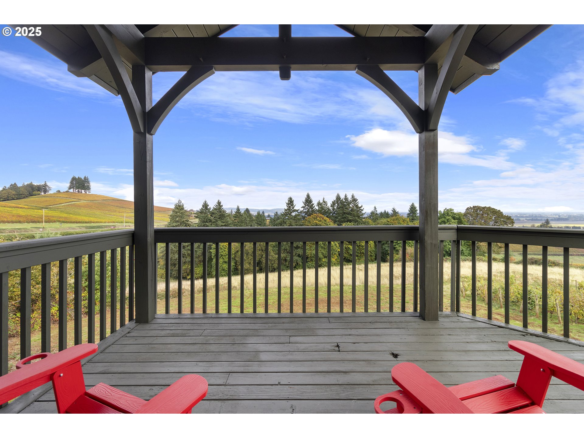 9325 Northeast Worden Hill Road Dundee, OR 97115 - Photo 25 of 48 a view of balcony with wooden floor and seating space