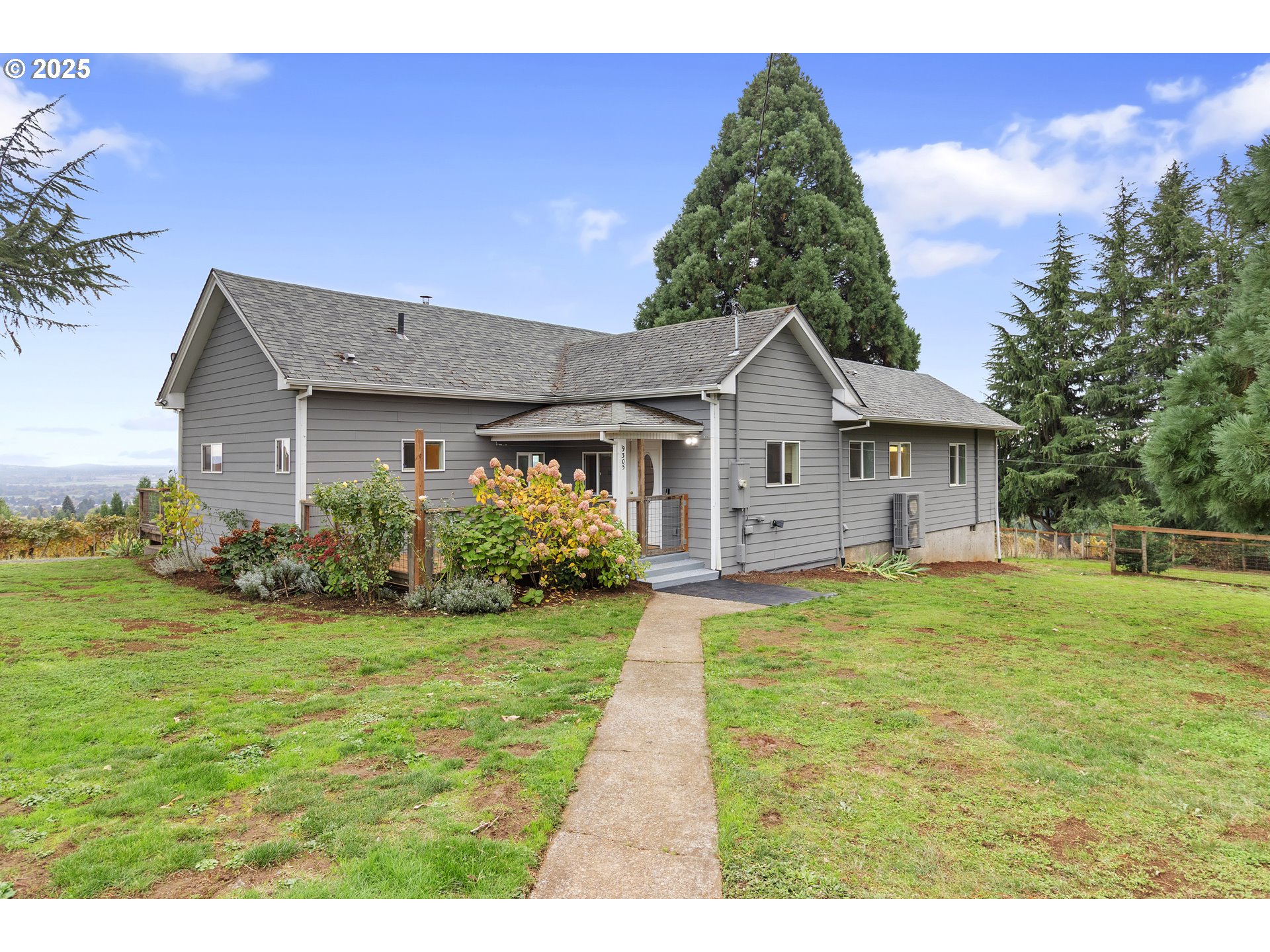 9325 Northeast Worden Hill Road Dundee, OR 97115 - Photo 27 of 48 a view of a house with backyard and garden
