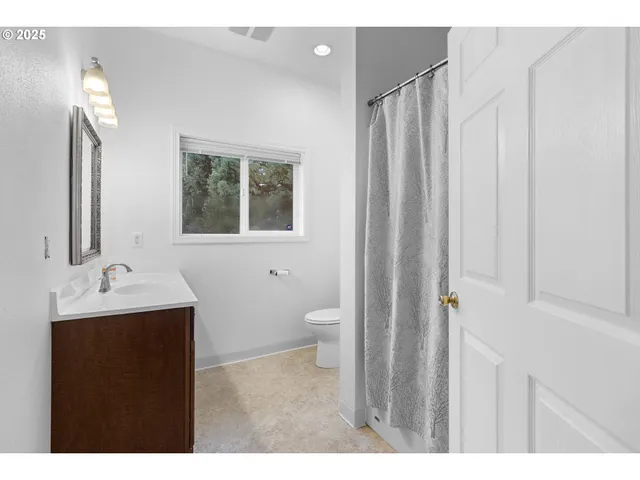 a view of balcony with wooden floor