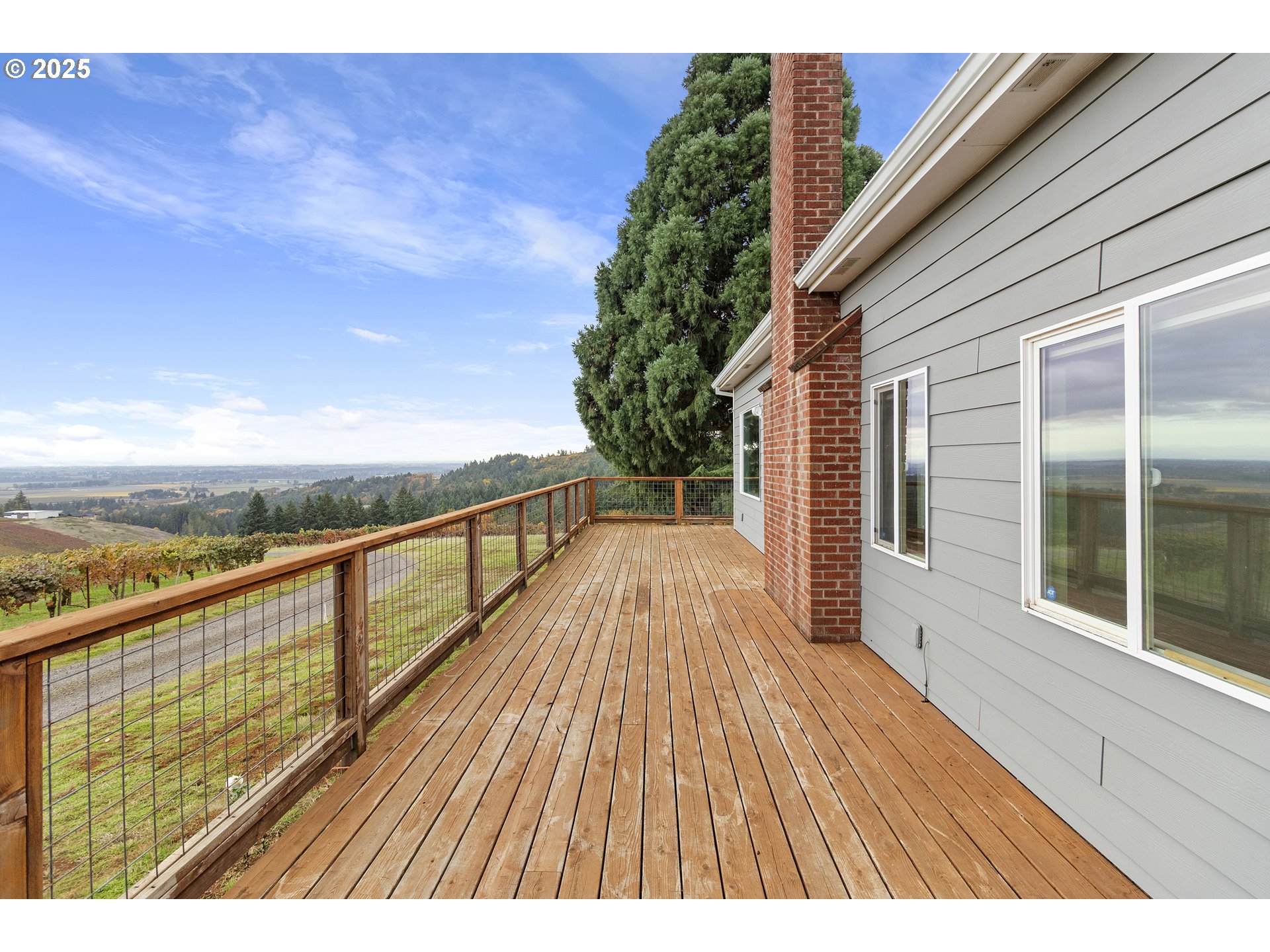 9325 Northeast Worden Hill Road Dundee, OR 97115 - Photo 35 of 48 a view of balcony with wooden floor