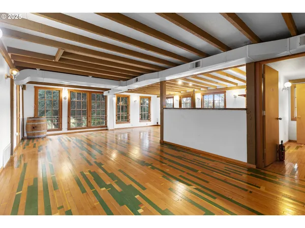 a view of hallway with furniture