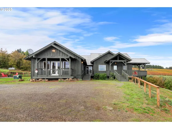 a view of a living room and balcony
