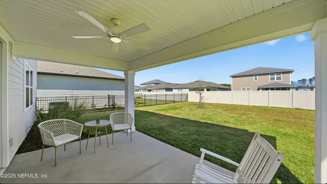 a view of balcony with furniture