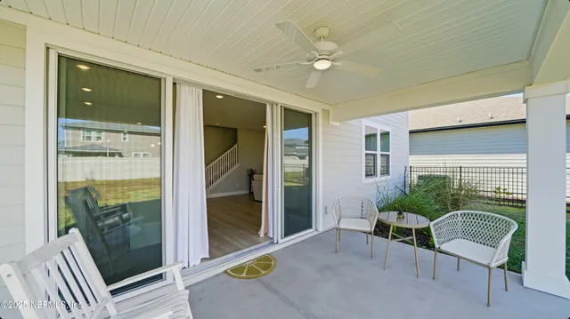 a front view of a house with a big yard