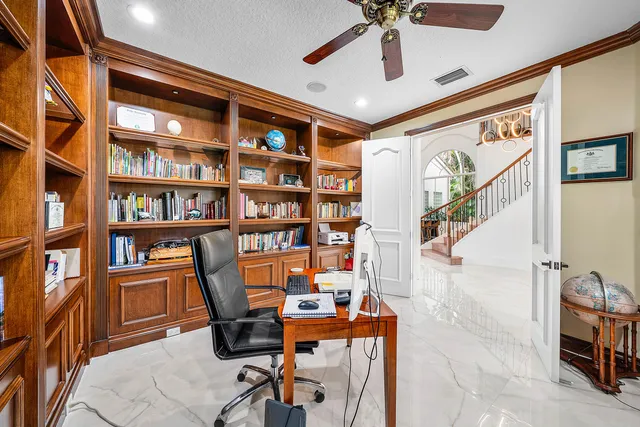 a living room with granite countertop furniture and a large window