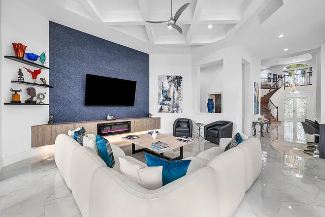 a view of a living room and a wooden floor