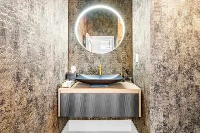 a view of a swimming pool with palm trees