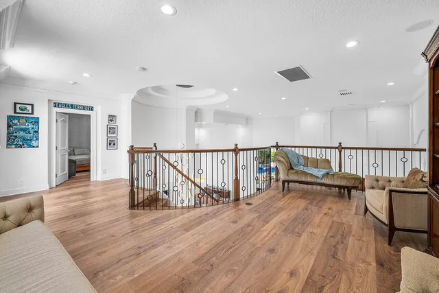 a bedroom with a bed and a table