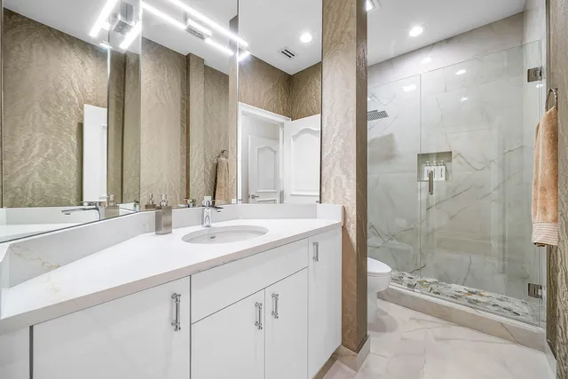 an aerial view of a house with a garden and plants