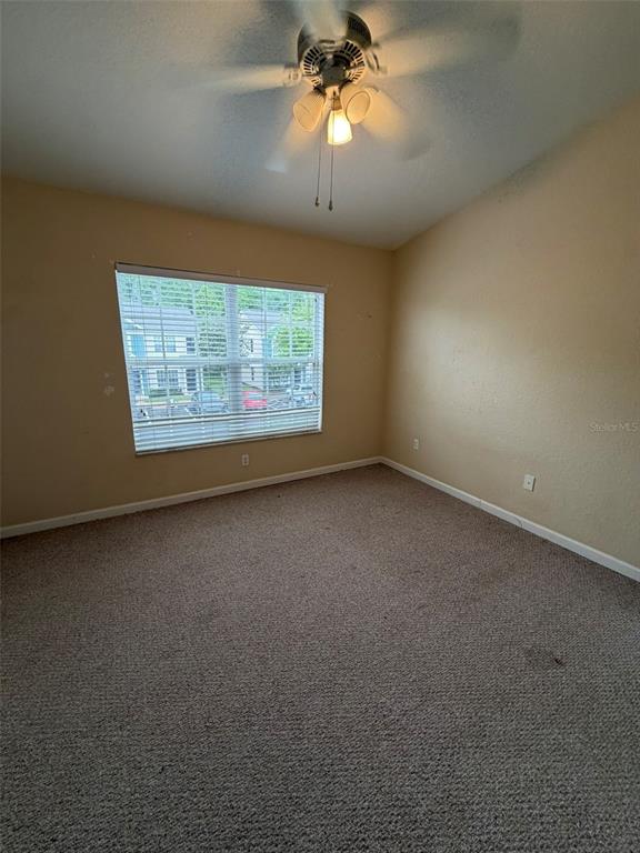 809 Shropshire Loop Sanford, FL 32771 - Photo 15 of 21 an empty room with a window
