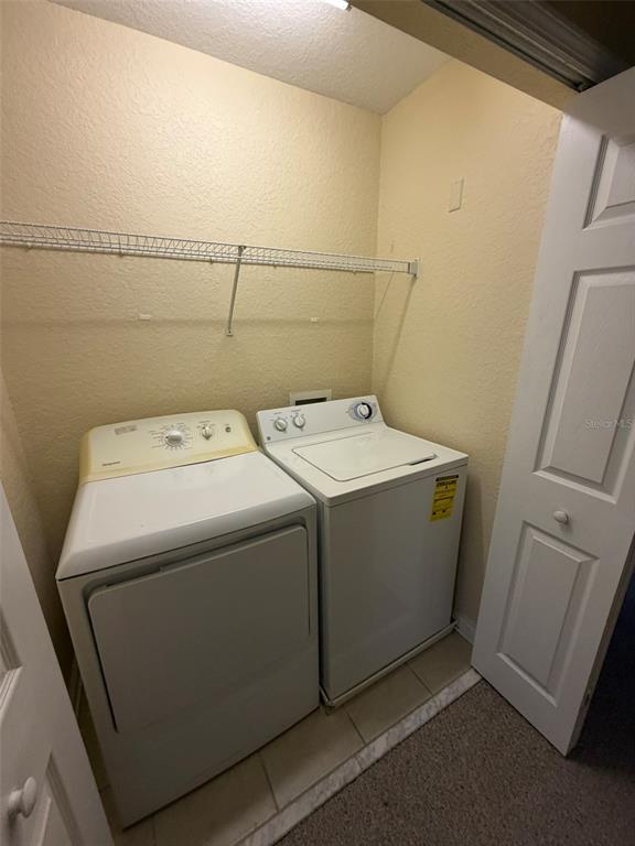 809 Shropshire Loop Sanford, FL 32771 - Photo 19 of 21 a utility room with dryer and washer