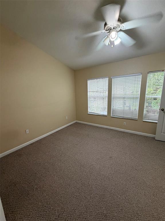 809 Shropshire Loop Sanford, FL 32771 - Photo 9 of 21 an empty room with a window