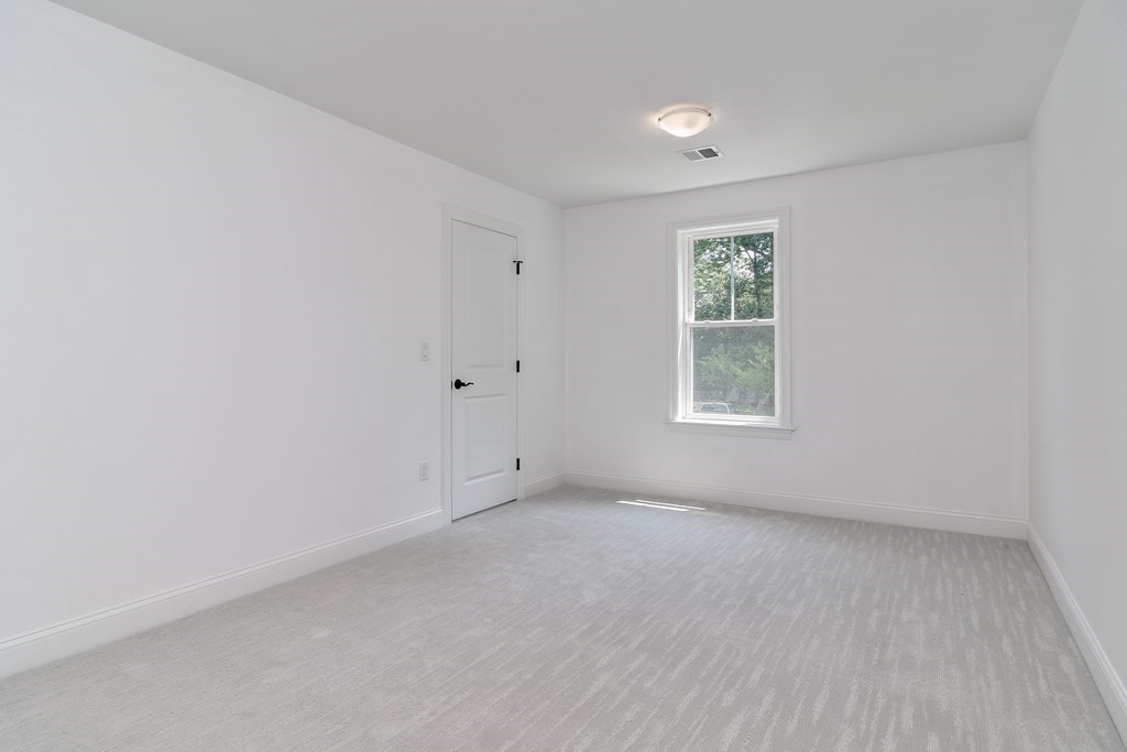 33 Birch Road Natick, MA 01760 - Photo 26 of 35 wooden floor in an empty room with a window