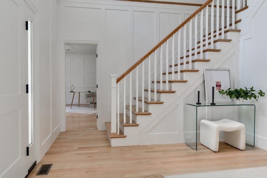 33 Birch Road Natick, MA 01760 - Photo 3 of 35 a view of entryway and hall with wooden floor
