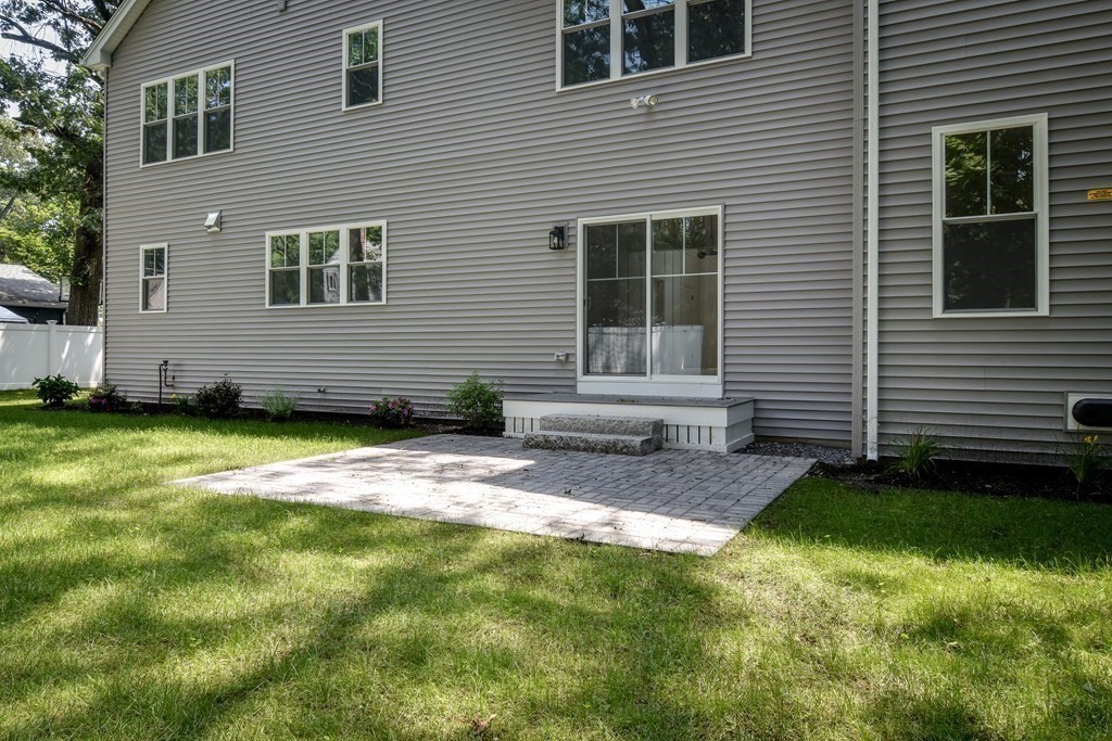 33 Birch Road Natick, MA 01760 - Photo 33 of 35 a view of a backyard with a garden