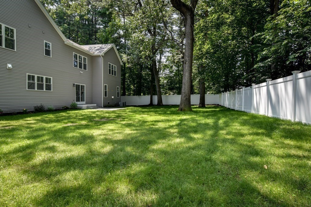 33 Birch Road Natick, MA 01760 - Photo 34 of 35 a view of a house with a yard