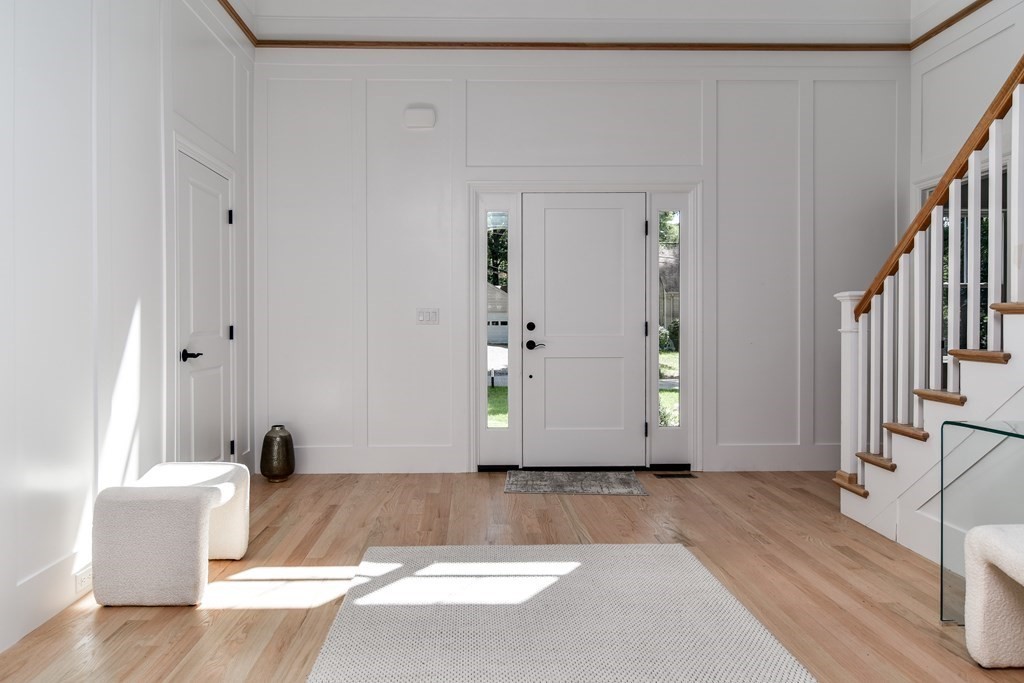 33 Birch Road Natick, MA 01760 - Photo 4 of 35 a view of an entryway with wooden floor