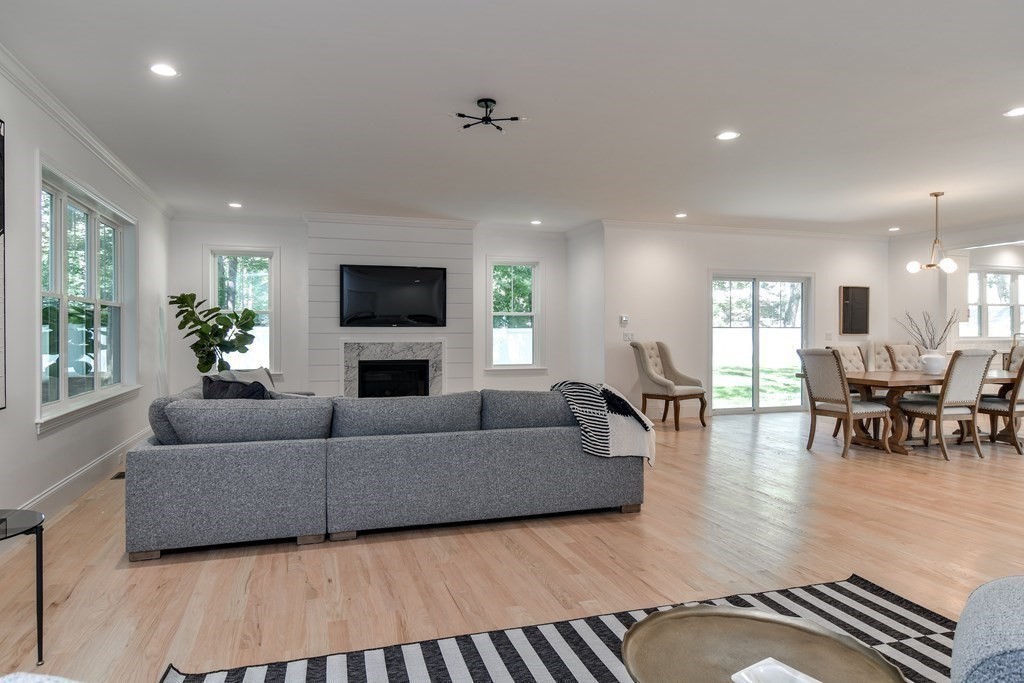 33 Birch Road Natick, MA 01760 - Photo 8 of 35 a living room with furniture and a fireplace