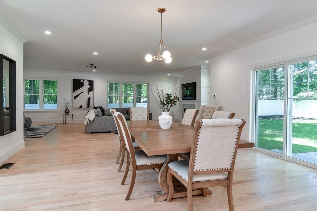 33 Birch Road Natick, MA 01760 - Photo 10 of 35 a view of a dining room with furniture window and wooden floor