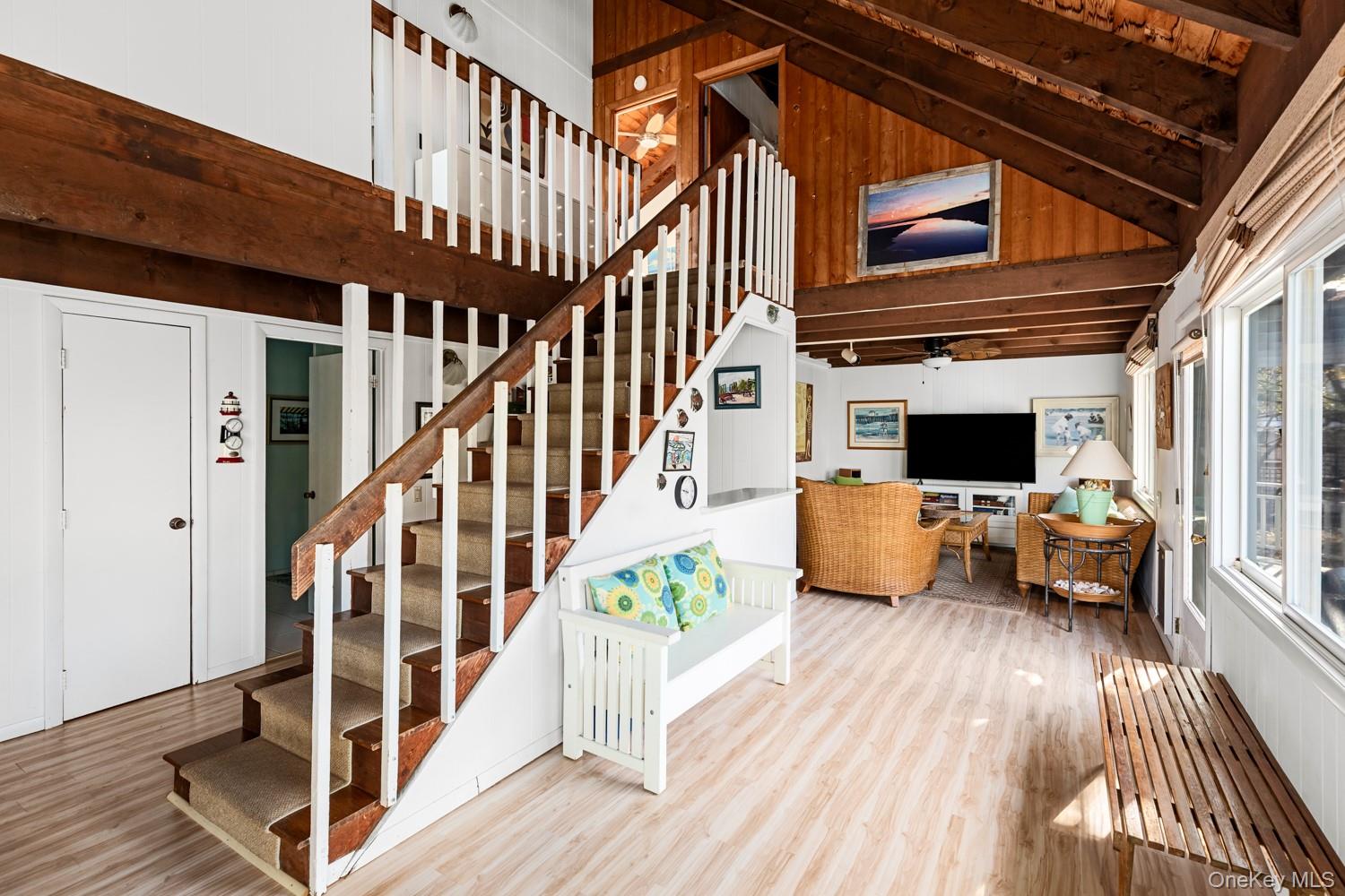 200 Clipper Road Ocean Beach, NY 11706 - Photo 12 of 29 a outdoor space with lots of furniture and wooden floor