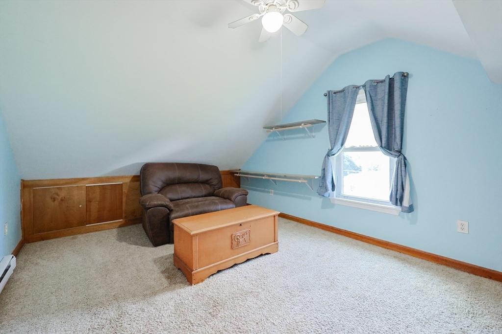 107 Lake Street, Unit B Webster, MA 01570 - Photo 13 of 42 a living room with furniture and a window