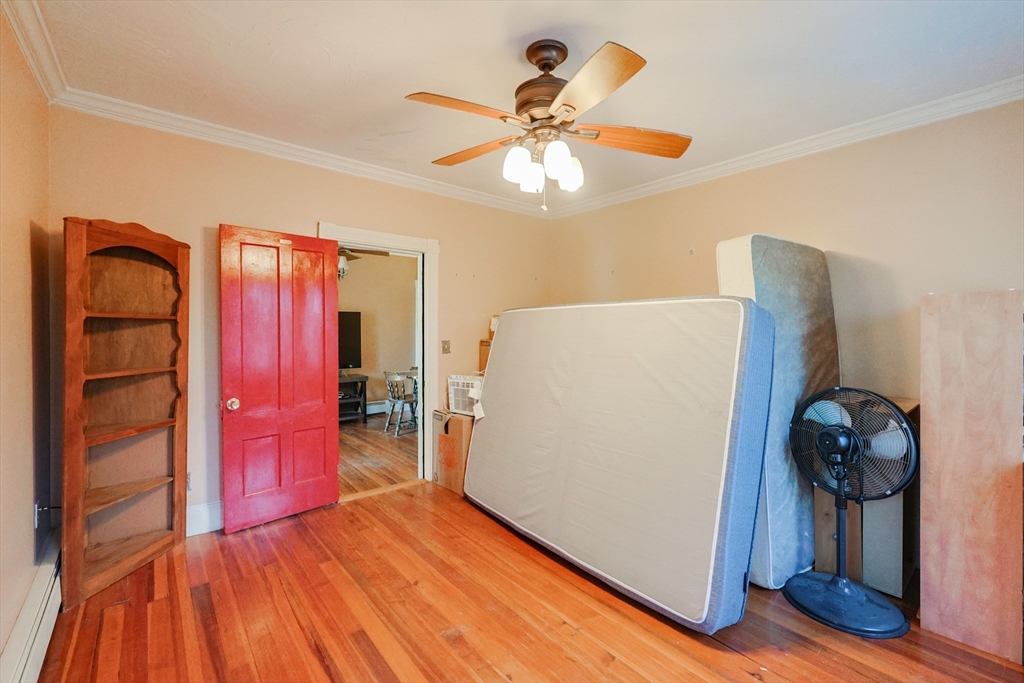 107 Lake Street, Unit B Webster, MA 01570 - Photo 17 of 42 a view of entryway and hall with wooden floor