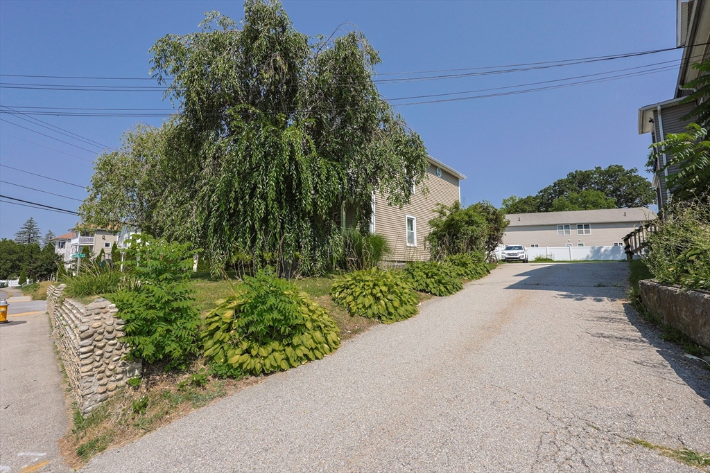 107 Lake Street, Unit B Webster, MA 01570 - Photo 35 of 42 a view of a street with a building in the background