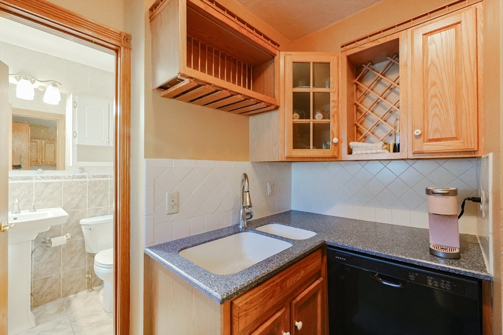 107 Lake Street, Unit B Webster, MA 01570 - Photo 4 of 42 a bathroom with a sink a vanity and a shower