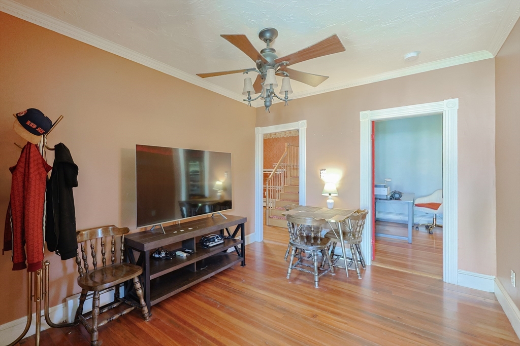 107 Lake Street, Unit B Webster, MA 01570 - Photo 6 of 42 a living room with furniture and a flat screen tv