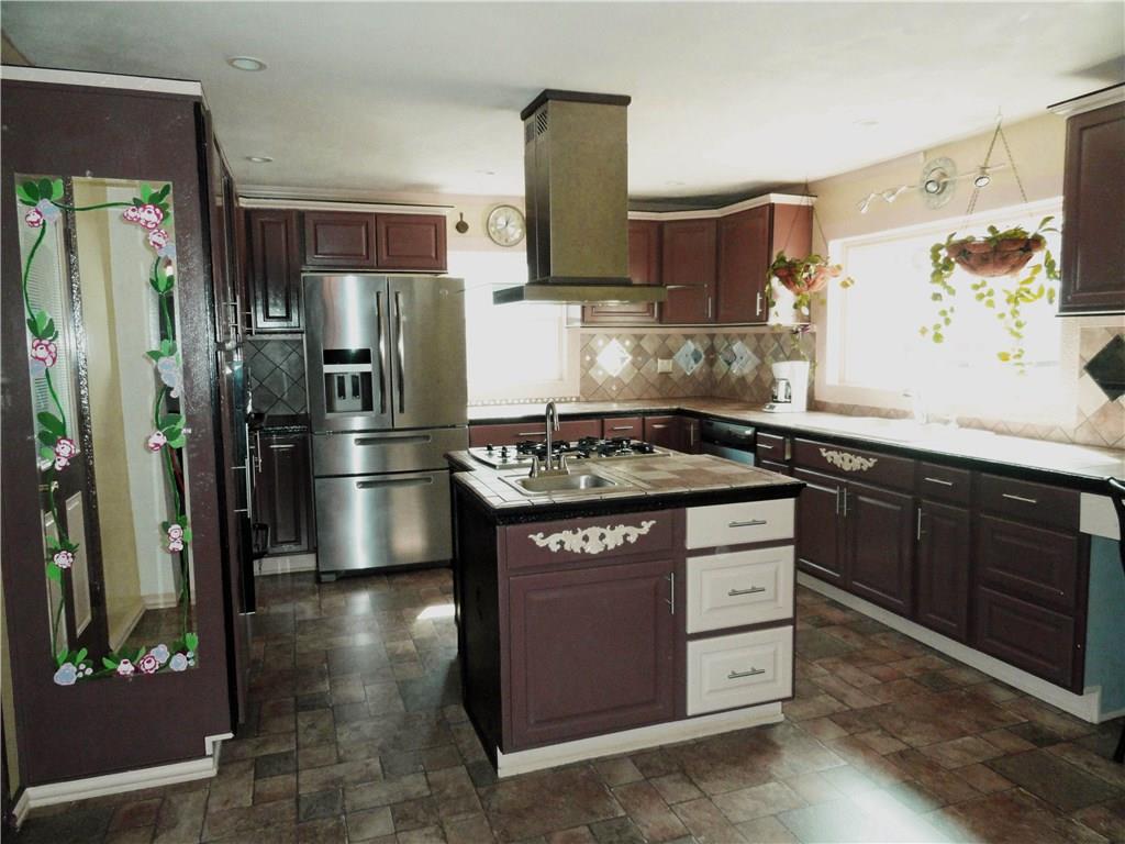 195 Kerr Road Greensburg, PA 15601 - Photo 11 of 25 Kitchen island with gas cook top and prep sink