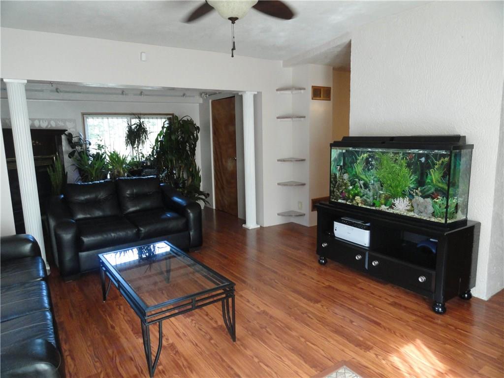 195 Kerr Road Greensburg, PA 15601 - Photo 5 of 25 Living room with laminate flooring