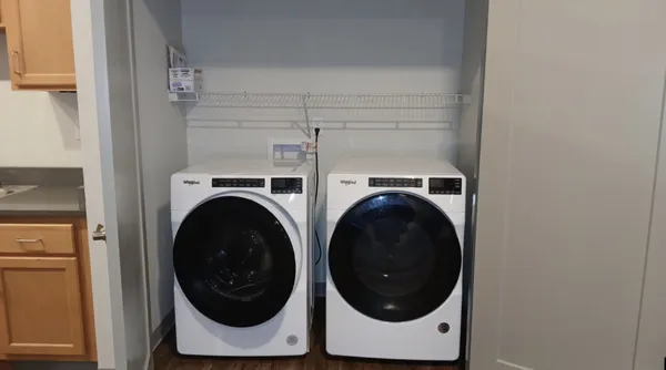 a utility room with dryer and washer