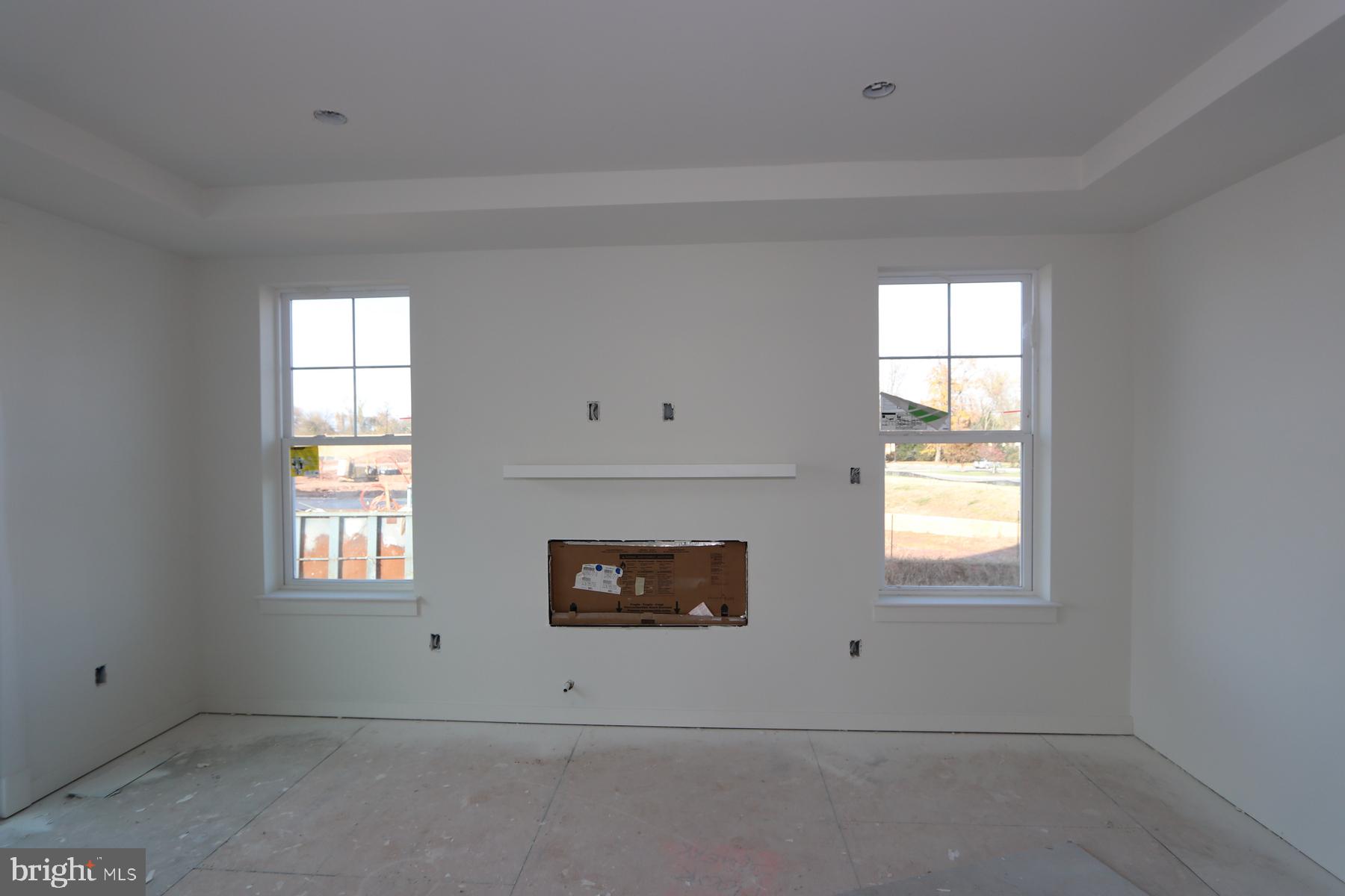 17403 Fyffe Road Poolesville, MD 20837 - Photo 4 of 6 an empty room with windows